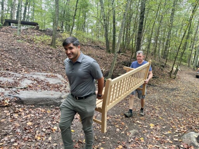 Ryan and Joe carrying bench
